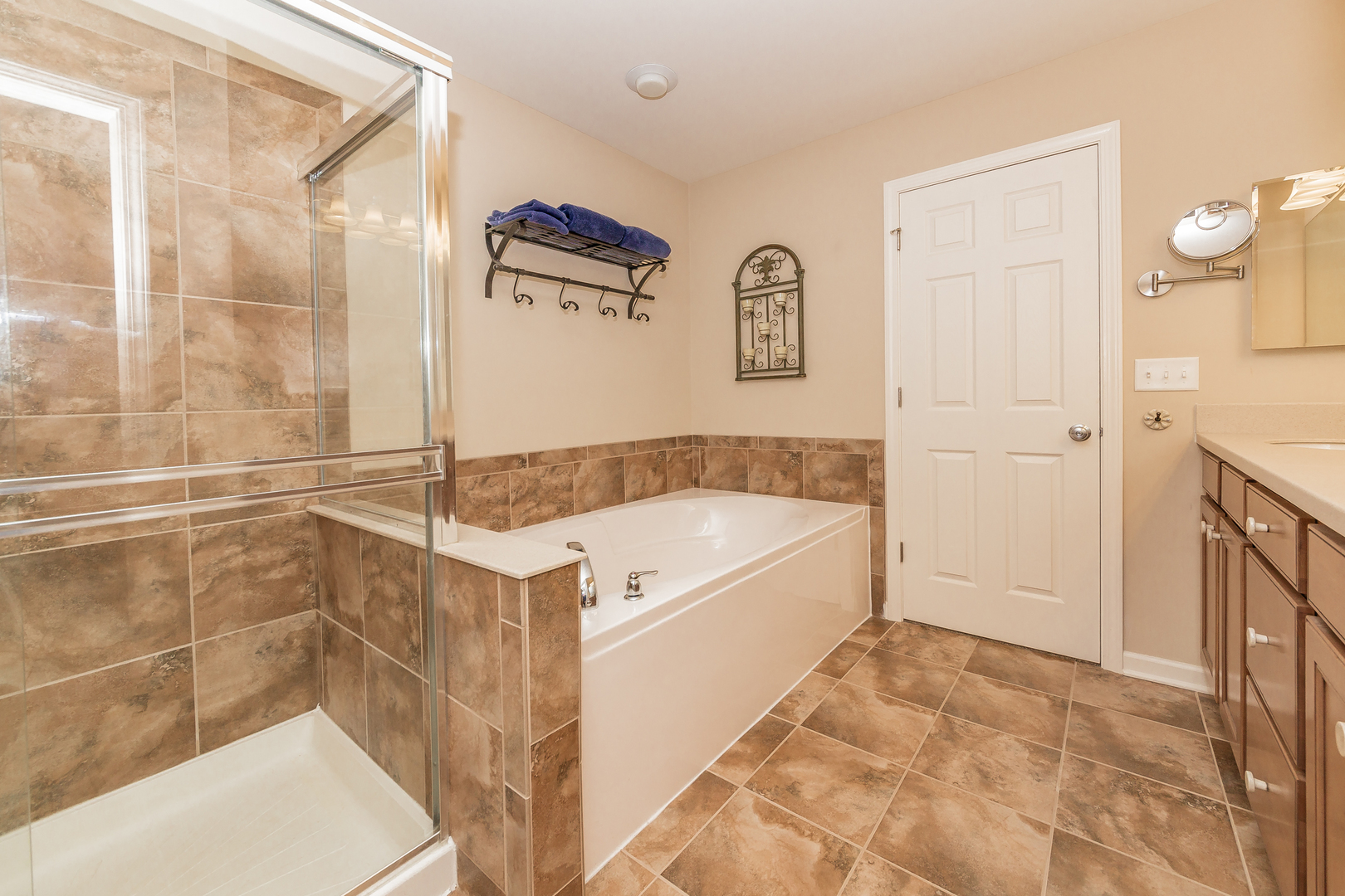 183 Reston Lane Gilberts, IL 60136 - Photo 21 of 26 a bathroom with a bathtub and a shower
