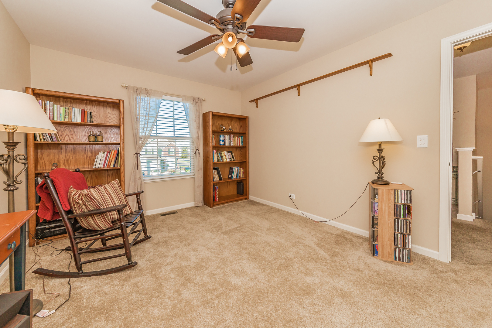 183 Reston Lane Gilberts, IL 60136 - Photo 23 of 26 a livingroom with furniture and a chandelier fan