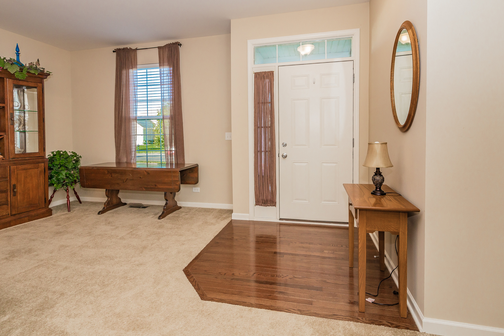 183 Reston Lane Gilberts, IL 60136 - Photo 6 of 26 a view of a livingroom with furniture and windows