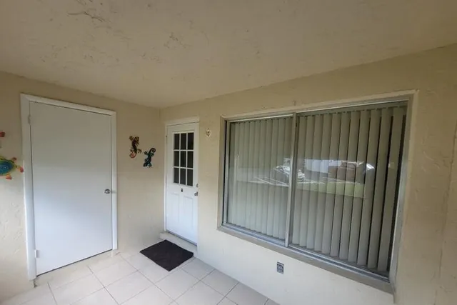 a kitchen with stainless steel appliances a refrigerator sink and stove