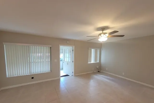 a view of a swimming pool and a yard