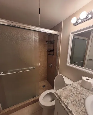 a swimming pool view with a lake view