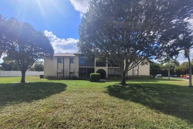 a view of a garden with a fountain