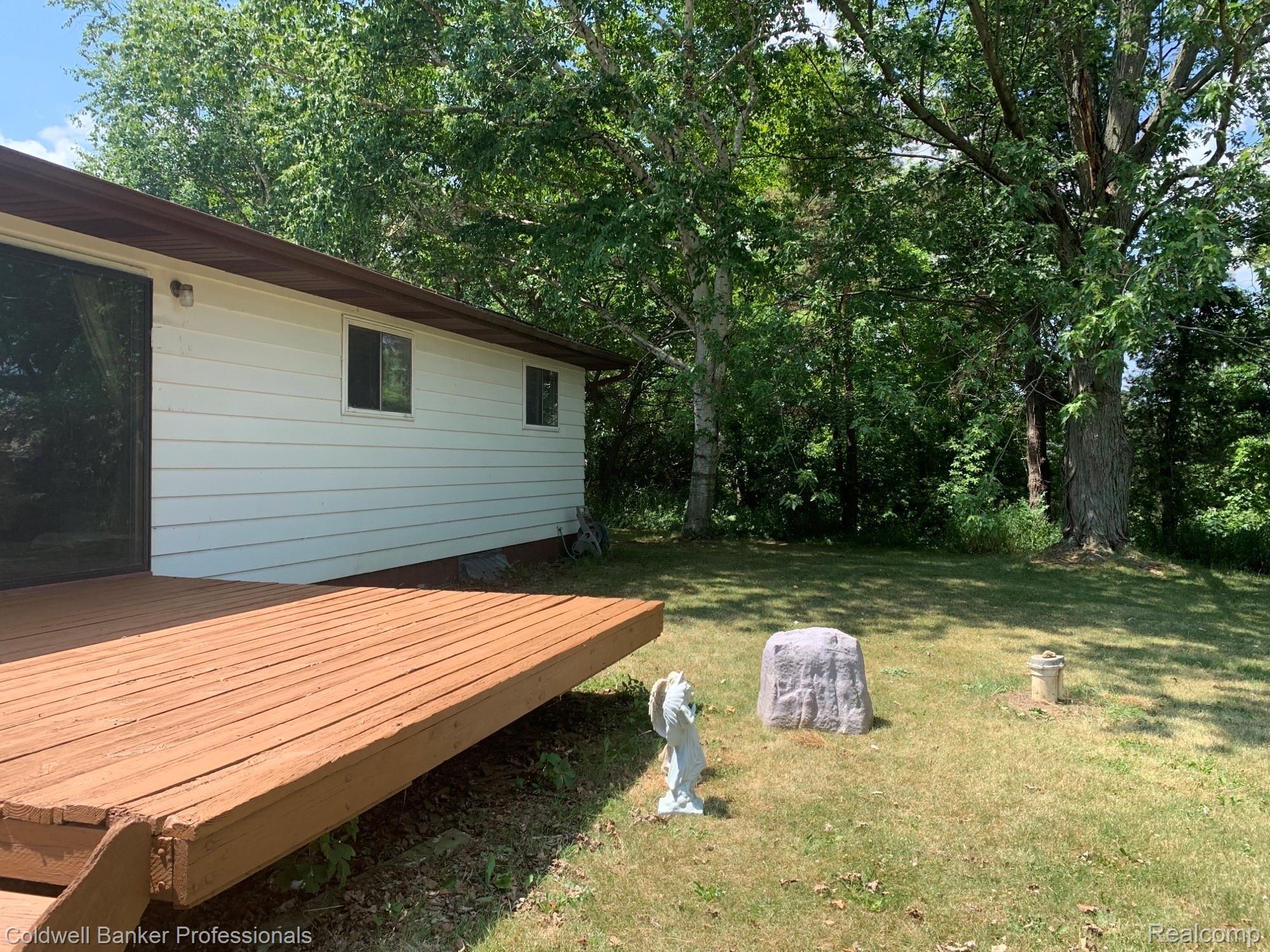 11425 Lytle Road Lennon, MI 48449 - Photo 28 of 29 Backyard with Deck
