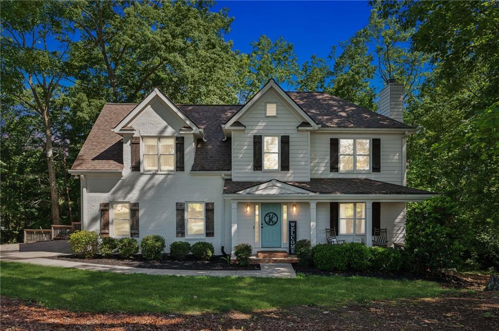 2055 Cokers Chapel Road Ball Ground, GA 30107 - Photo 1 of 1 a front view of a house with a yard