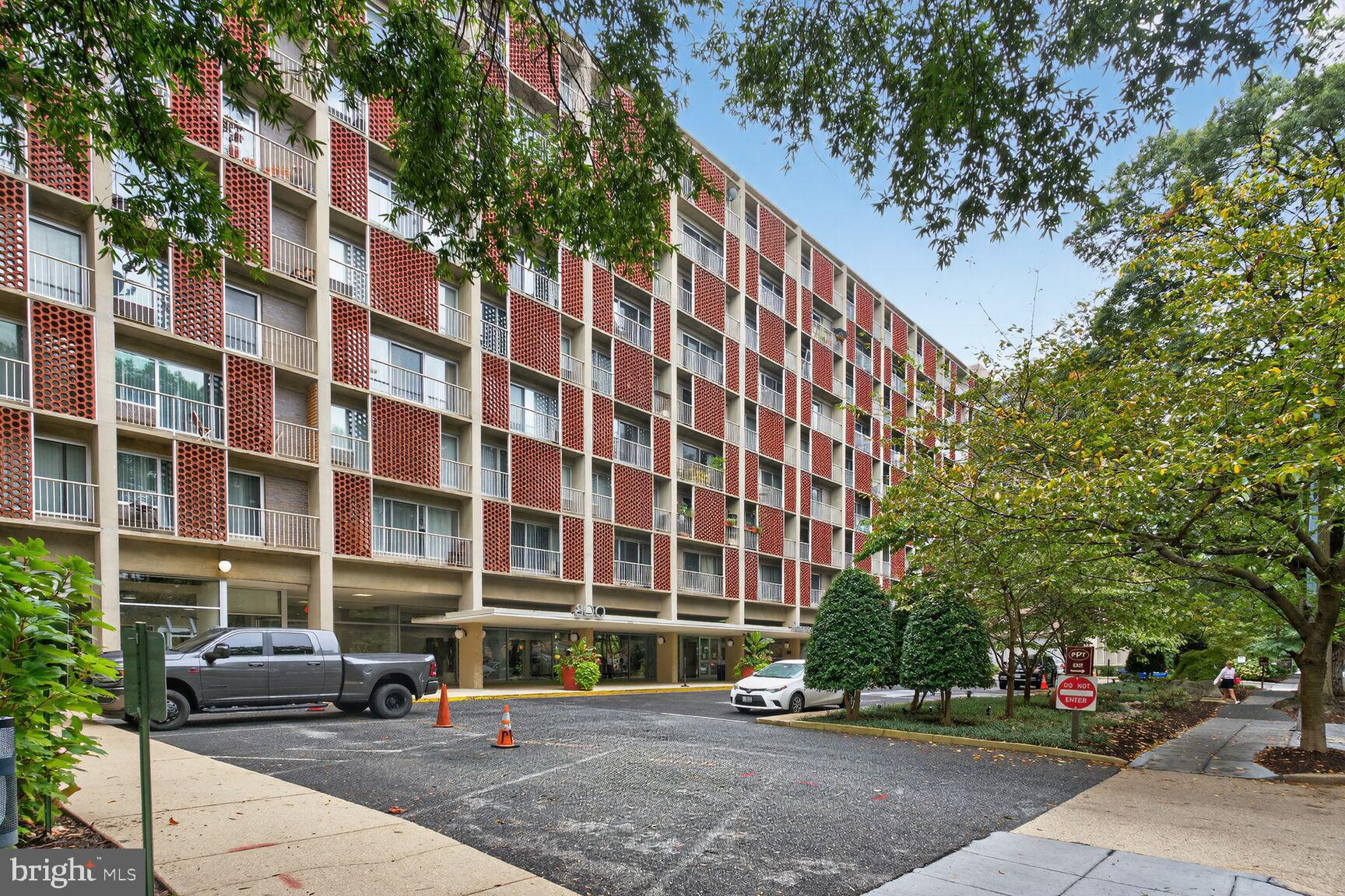 800 4th Street Southwest, Unit S221 Washington, DC 20024 - Photo 12 of 12 Modern urban living with lush greenery.