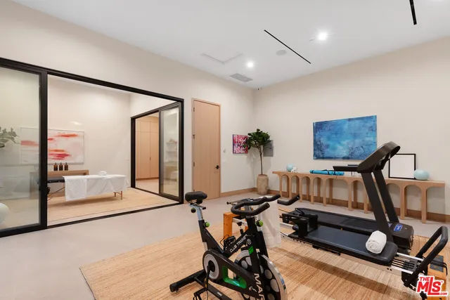 a view of a room with gym equipment