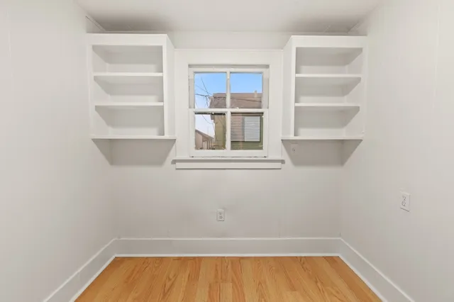 a view of a room with rack on the wall