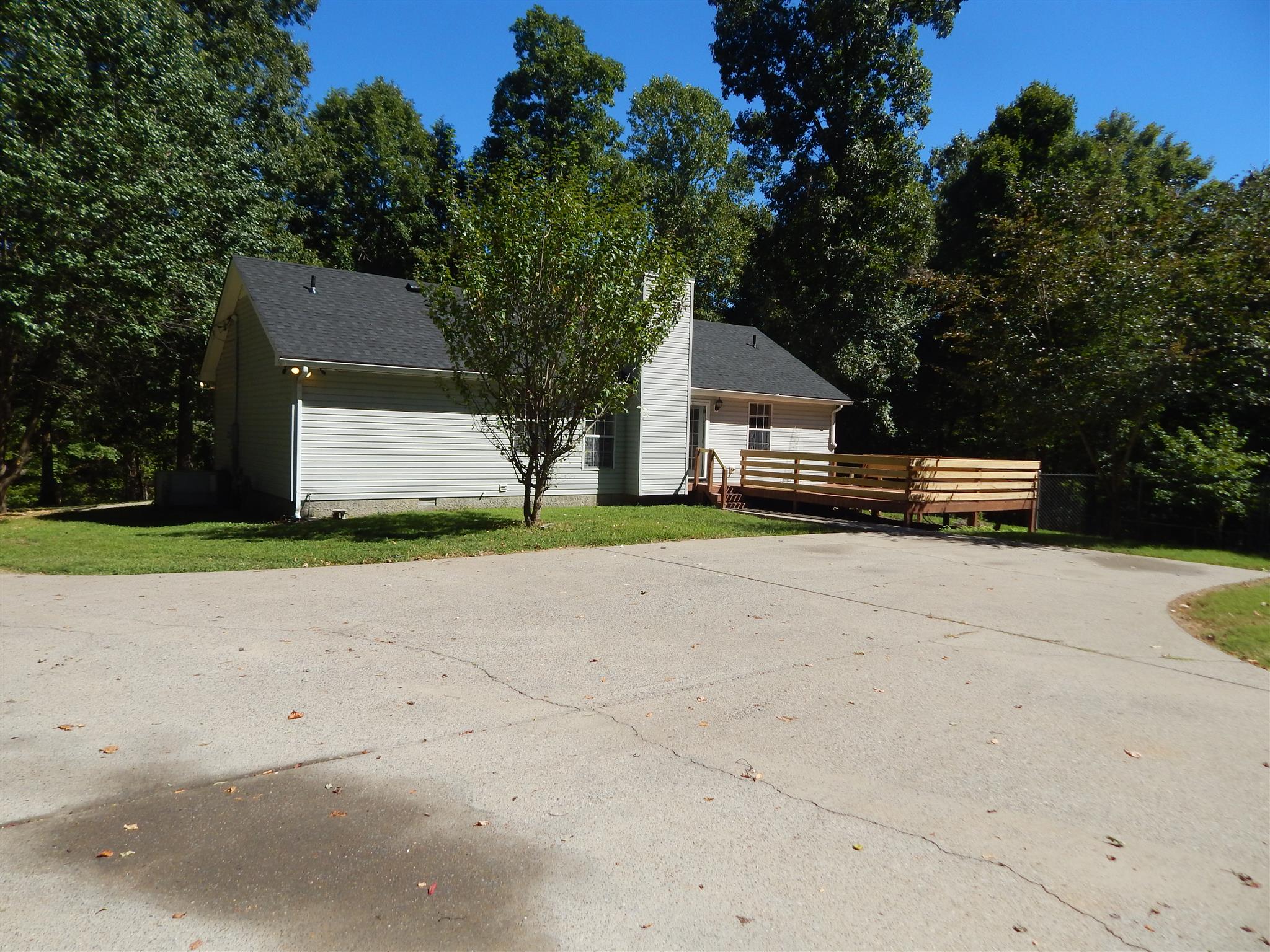 232 East Piney Road Dickson, TN 37055 - Photo 30 of 30 a front view of a house with a yard