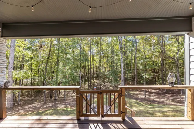 a view of a balcony with lake view