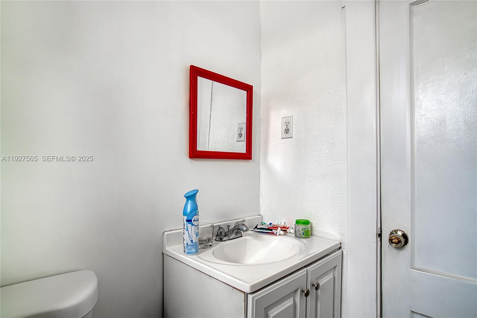 2516 Cleveland Street Hollywood, FL 33020 - Photo 22 of 42 a bathroom with a sink and a toilet