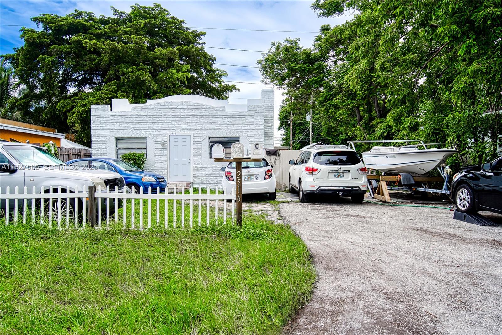 2516 Cleveland Street Hollywood, FL 33020 - Photo 41 of 42 a view of a parked cars in front of a house