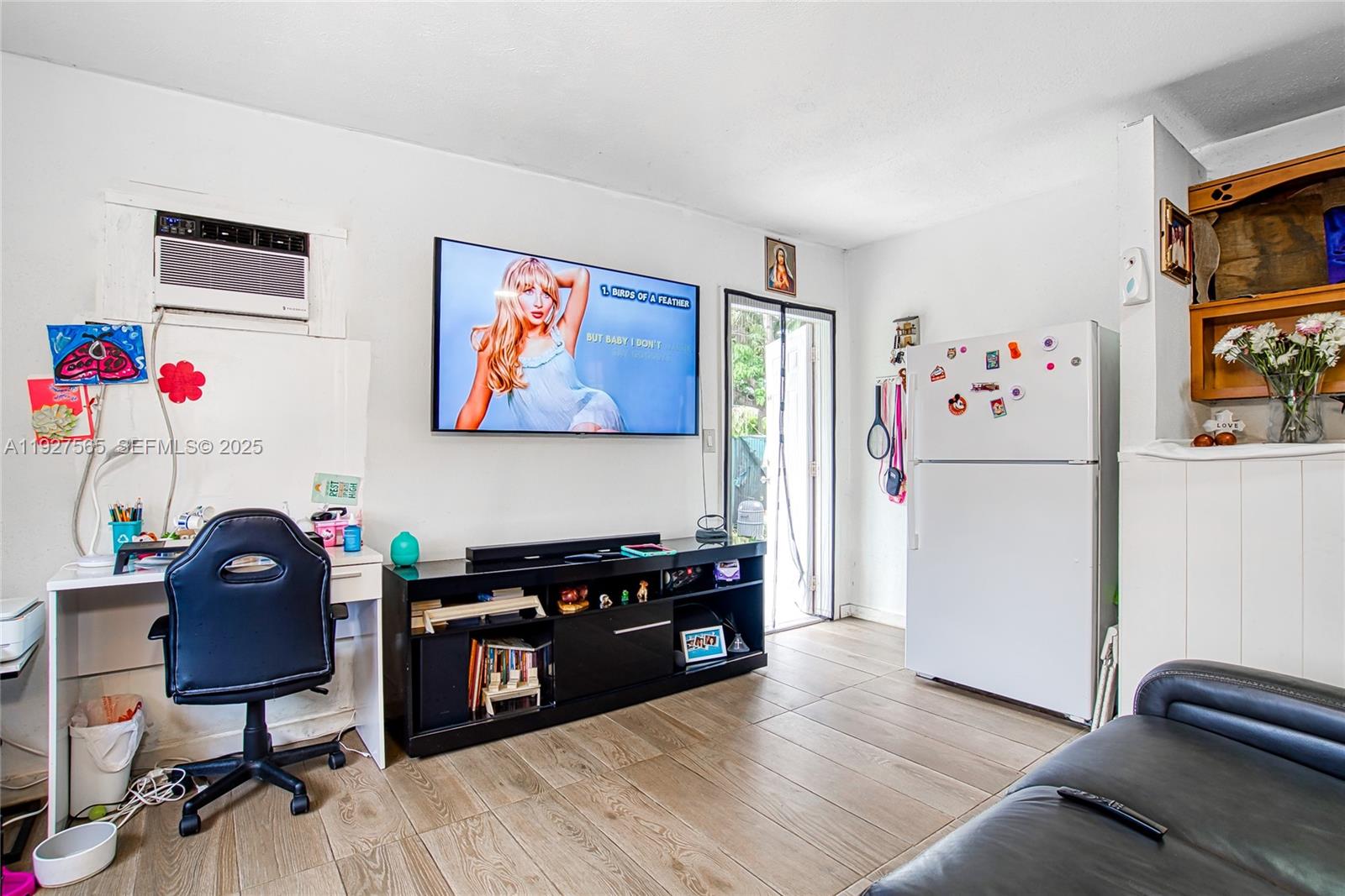 2516 Cleveland Street Hollywood, FL 33020 - Photo 9 of 42 a view of a workspace with furniture and toys