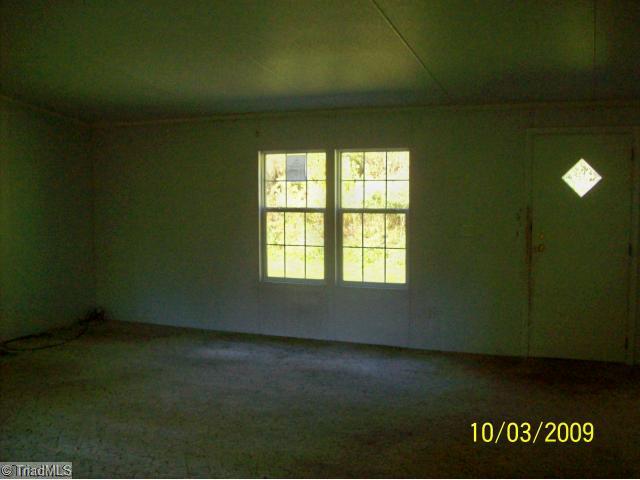1125 Chestnut Ridge Road Pilot Mountain, NC 27041 - Photo 8 of 11 Living Room.