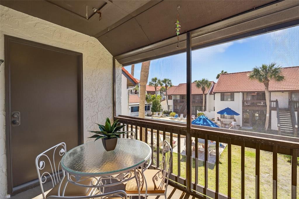 1632 Stickney Point Road, Unit 201 Sarasota, FL 34231 - Photo 13 of 43 a view of a dining room with furniture window and outside view