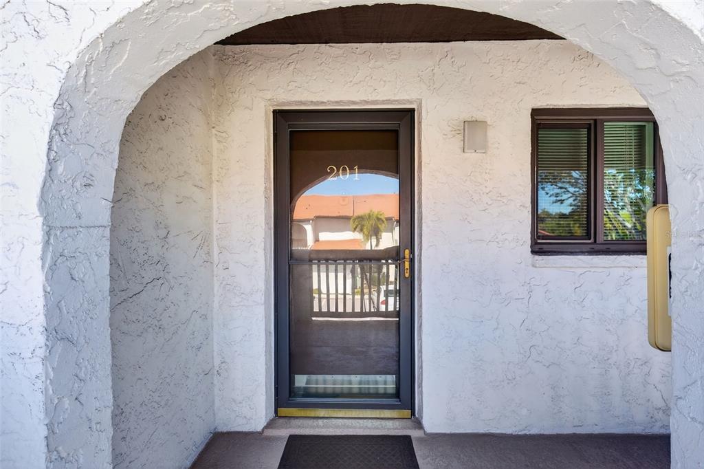 1632 Stickney Point Road, Unit 201 Sarasota, FL 34231 - Photo 24 of 43 a view of entryway with a front door