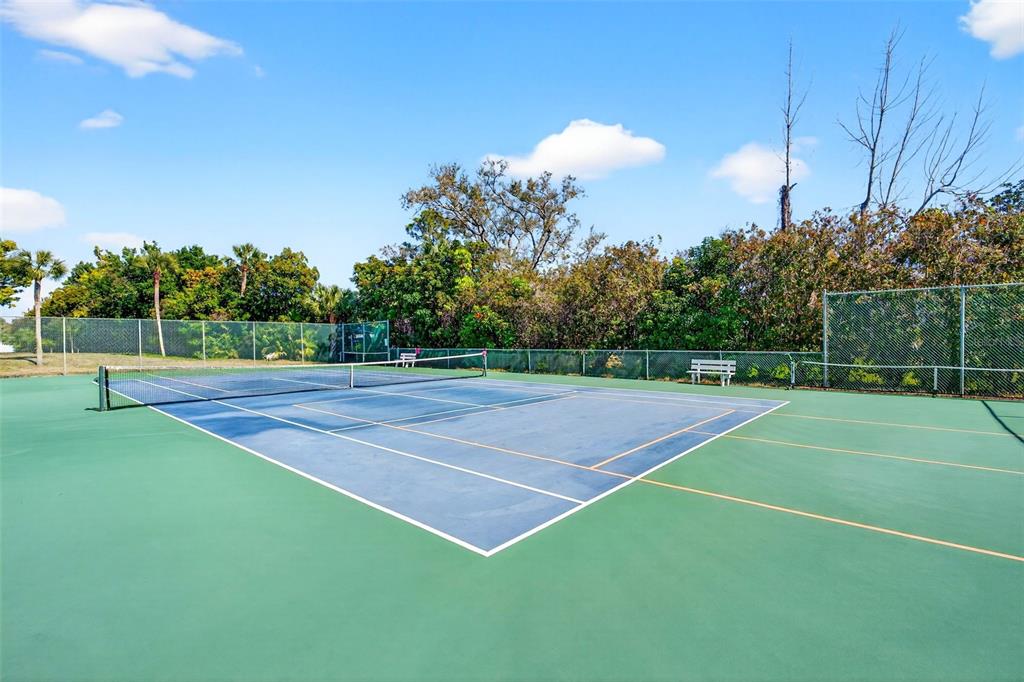 1632 Stickney Point Road, Unit 201 Sarasota, FL 34231 - Photo 27 of 43 a view of a tennis court