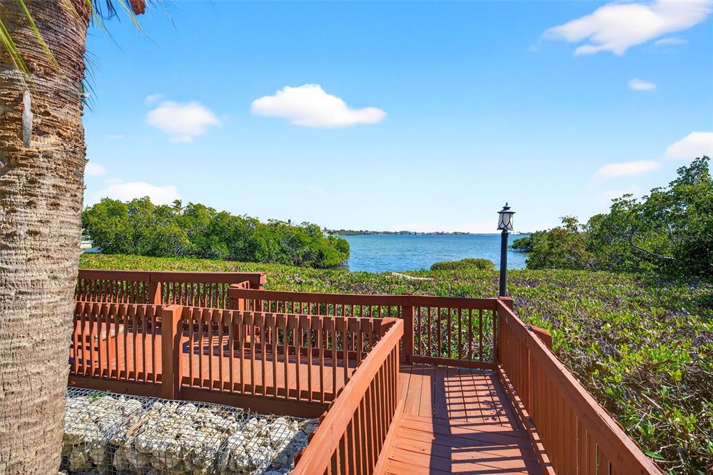 1632 Stickney Point Road, Unit 201 Sarasota, FL 34231 - Photo 28 of 43 a view of balcony with yard