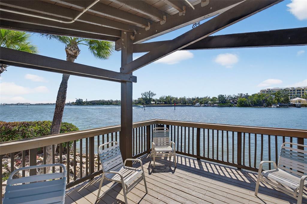 1632 Stickney Point Road, Unit 201 Sarasota, FL 34231 - Photo 31 of 43 a view of a balcony with wooden floor