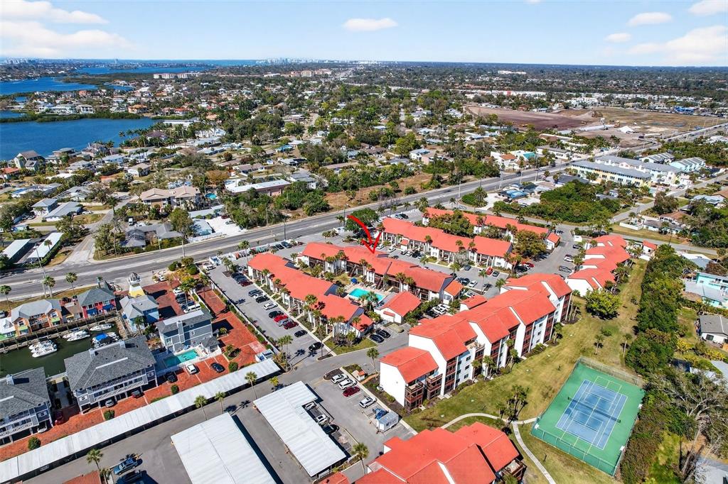 1632 Stickney Point Road, Unit 201 Sarasota, FL 34231 - Photo 35 of 43 an aerial view of residential houses with outdoor space