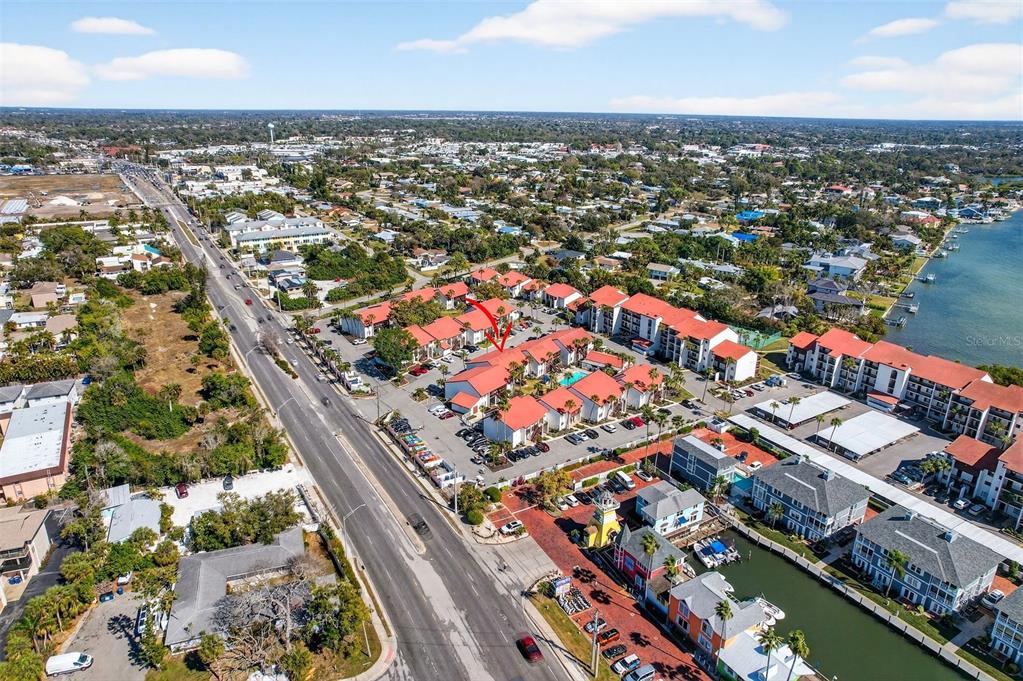 1632 Stickney Point Road, Unit 201 Sarasota, FL 34231 - Photo 36 of 43 an aerial view of city and lake