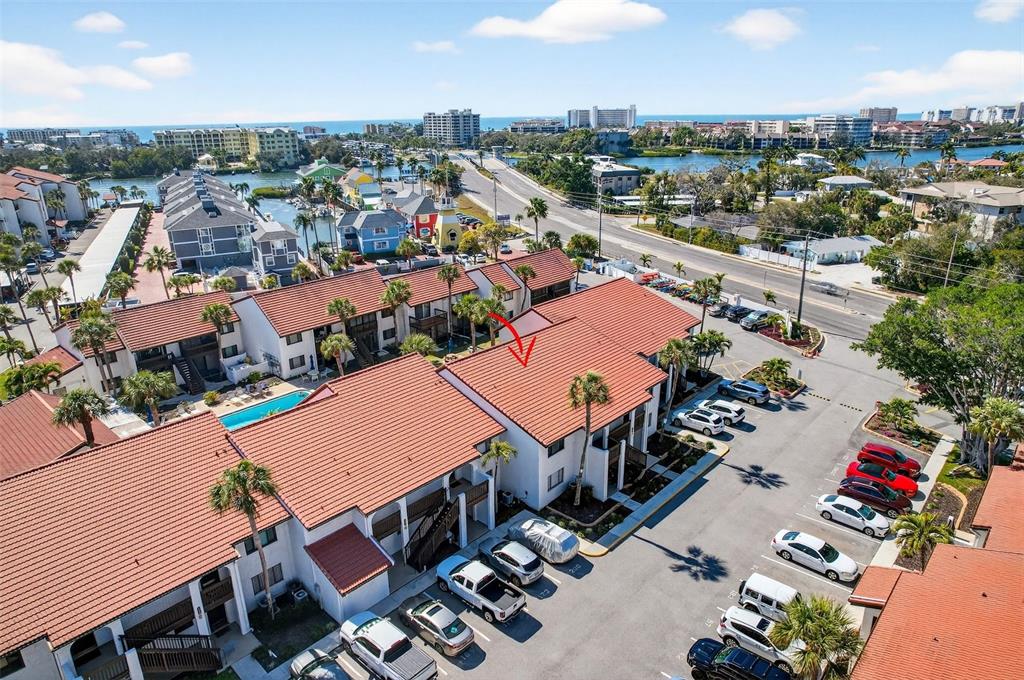 1632 Stickney Point Road, Unit 201 Sarasota, FL 34231 - Photo 39 of 43 an aerial view of residential houses with outdoor space