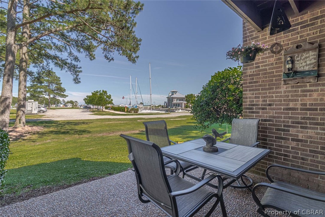 6839 Windmill Point Road White Stone, VA 22578 - Photo 13 of 50 Water view patio off the dining room