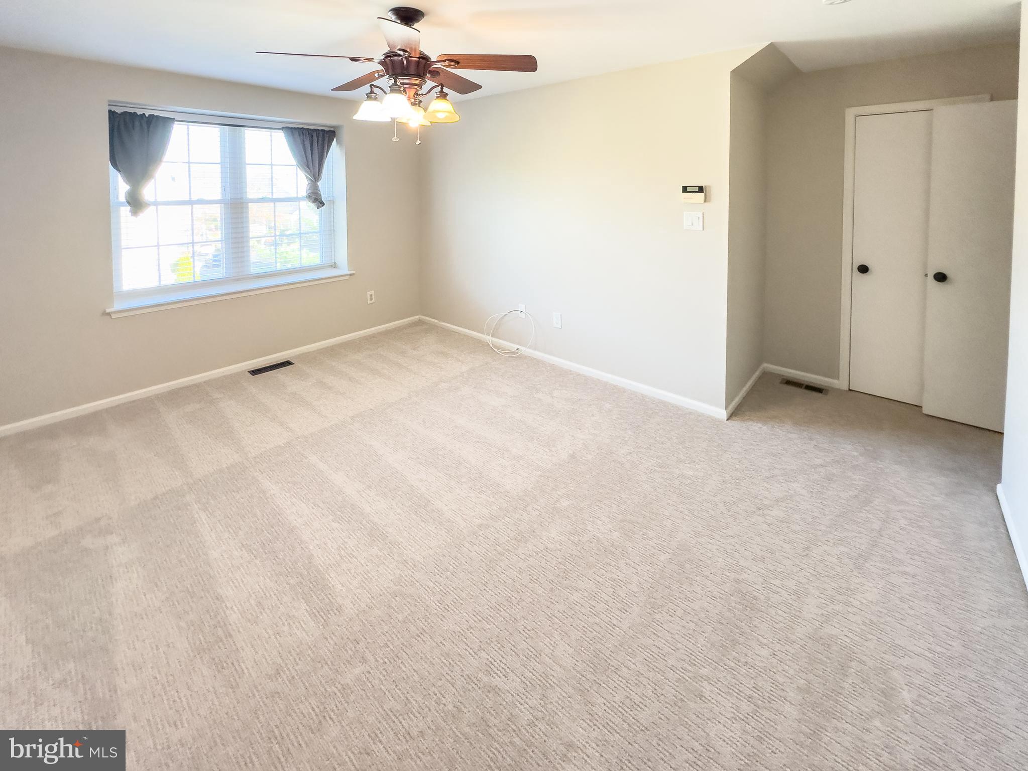 806 Wharton Road Mount Laurel, NJ 08054 - Photo 22 of 25 an empty room with windows and fan