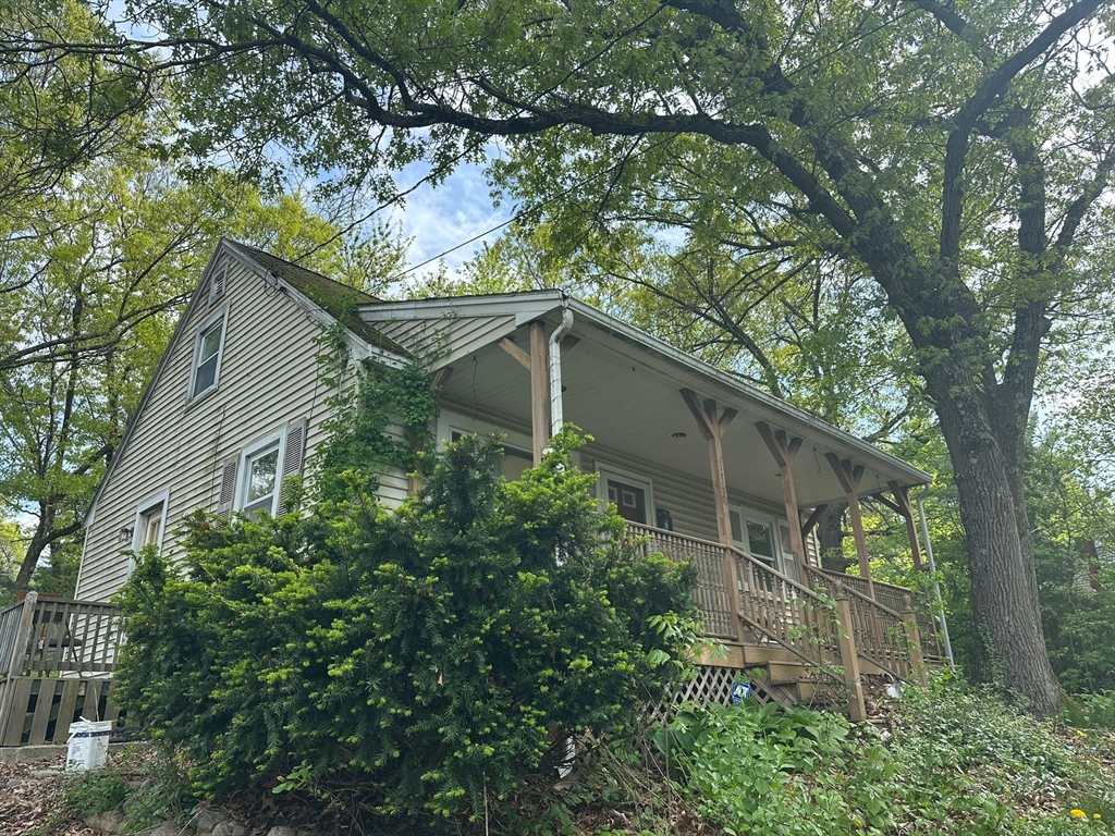 a backyard of a house with lots of green space