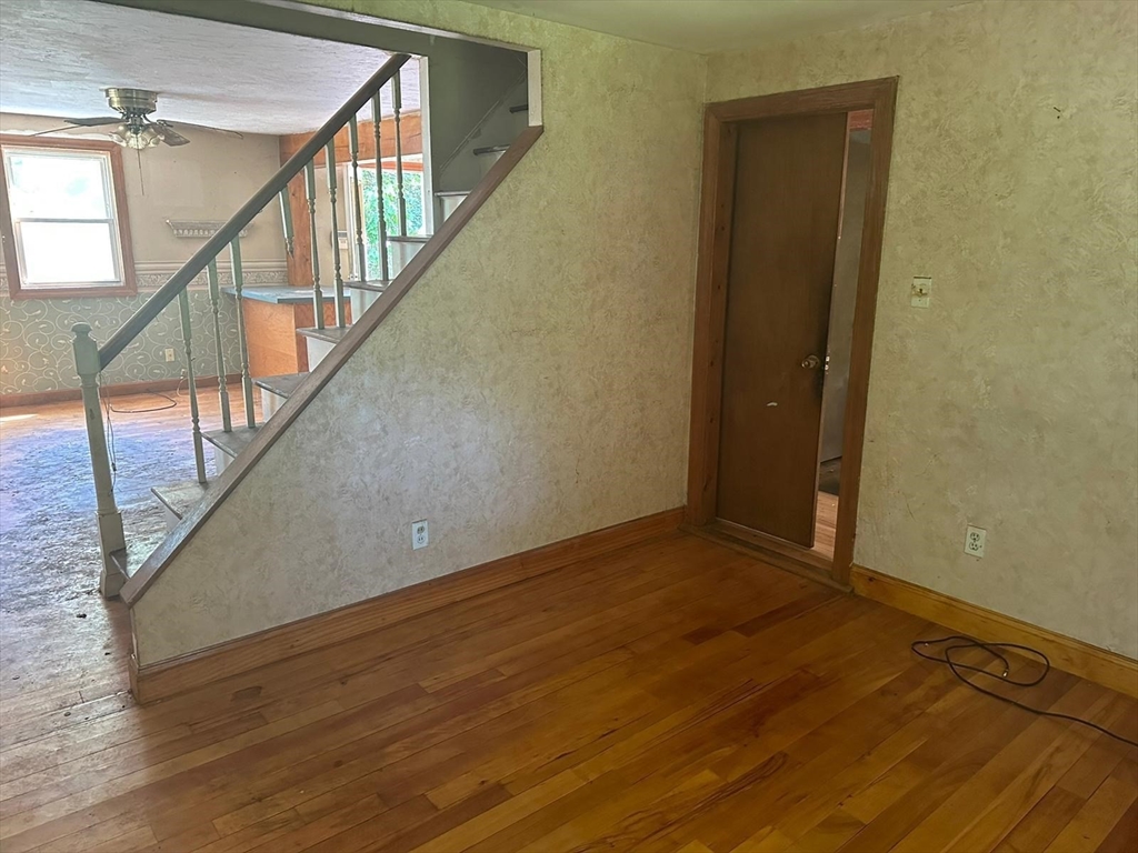 133 Salem Road Billerica, MA 01821 - Photo 15 of 32 a view of an empty room with wooden floor