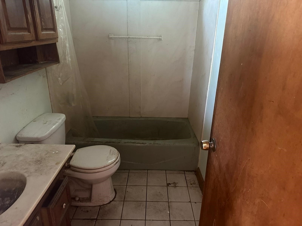 133 Salem Road Billerica, MA 01821 - Photo 22 of 32 a bathroom with a sink a toilet and bathtub