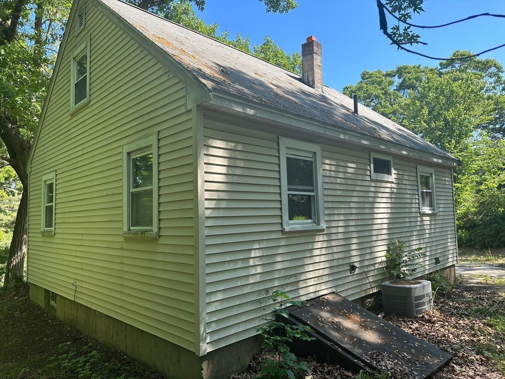 133 Salem Road Billerica, MA 01821 - Photo 3 of 32 a view of a backyard with plants