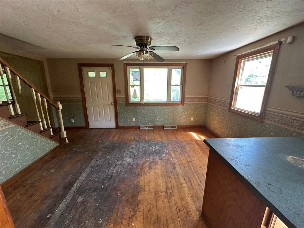 133 Salem Road Billerica, MA 01821 - Photo 10 of 32 a view of empty room with wooden floor and fan