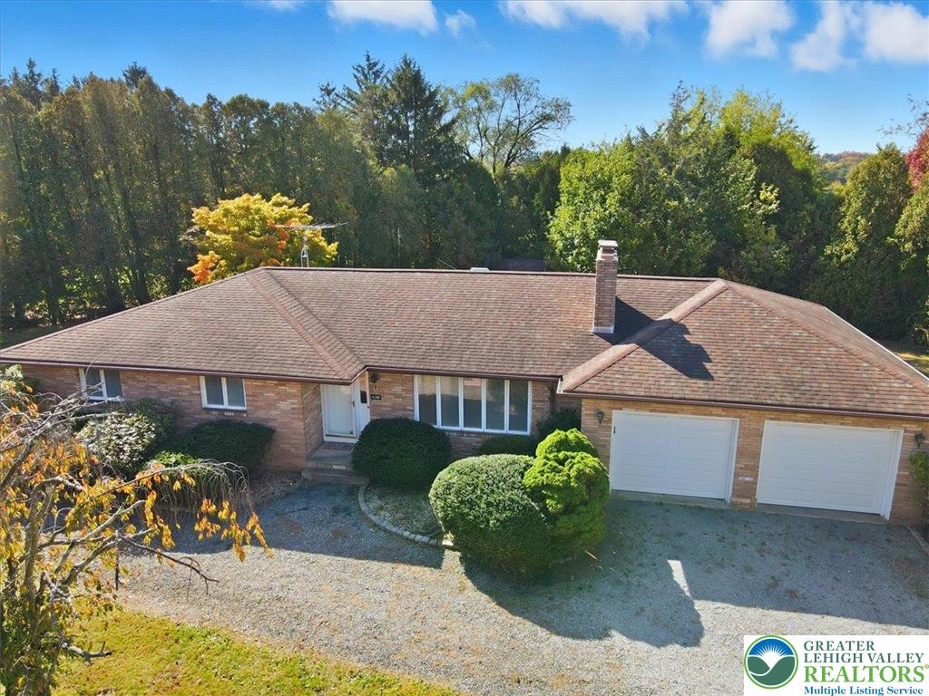4395 East Texas Road Allentown, PA 18103 - Photo 3 of 81 a view of a house with a yard and sitting area