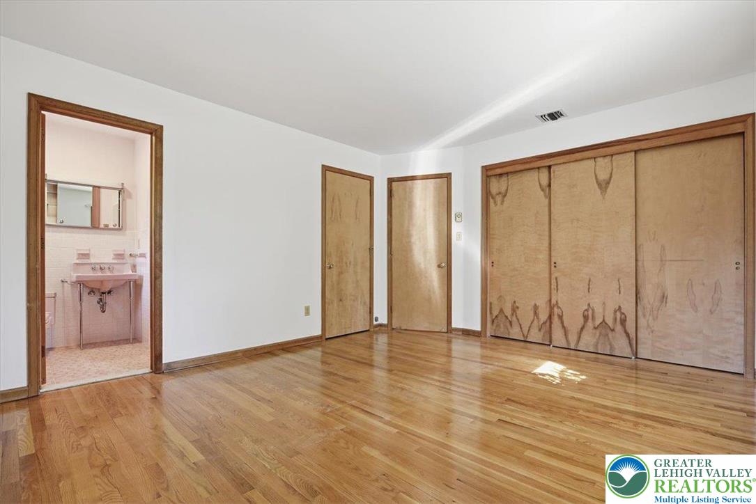 4395 East Texas Road Allentown, PA 18103 - Photo 39 of 81 a view of an empty room with wooden floor