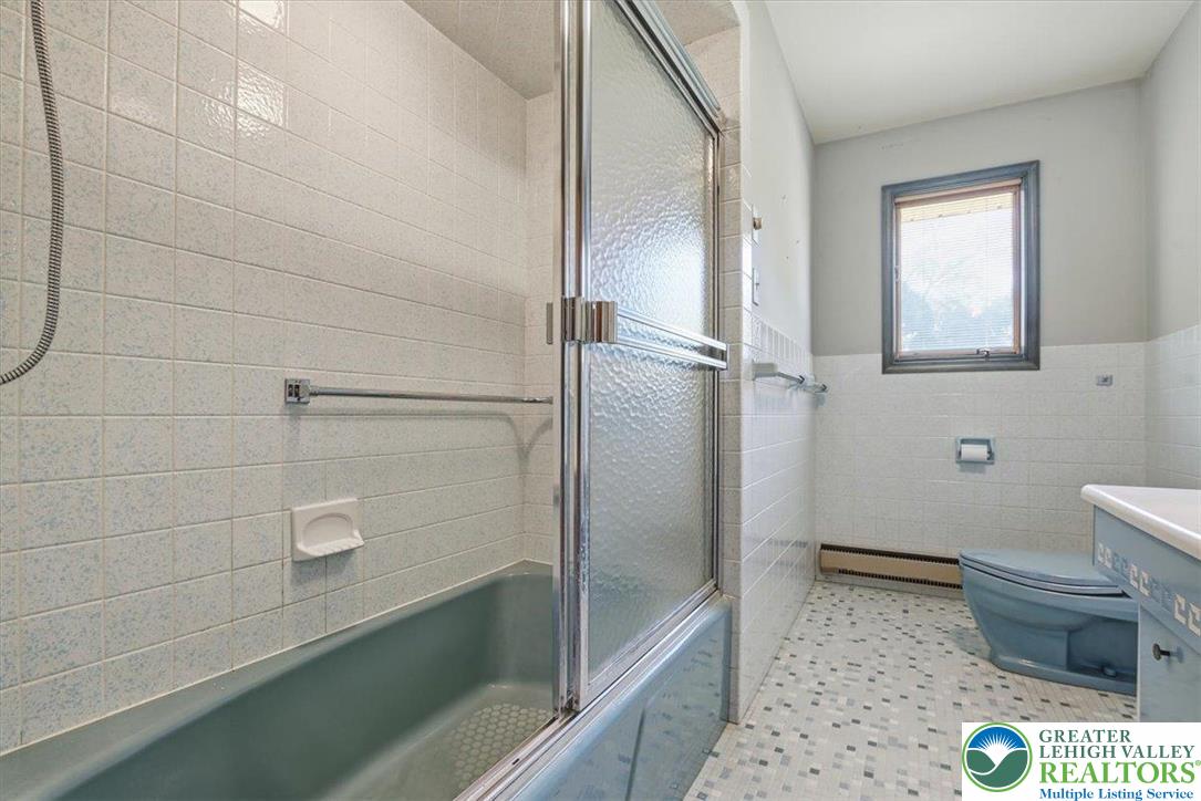 4395 East Texas Road Allentown, PA 18103 - Photo 46 of 81 a bathroom with a sink and a toilet