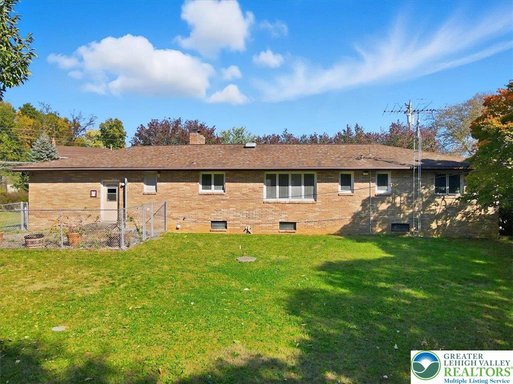 4395 East Texas Road Allentown, PA 18103 - Photo 57 of 81 a view of a house with a big yard and a fountain