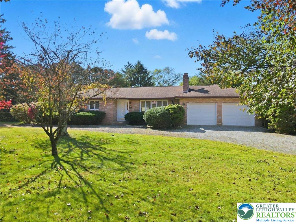 4395 East Texas Road Allentown, PA 18103 - Photo 7 of 81 a front view of house with yard and green space