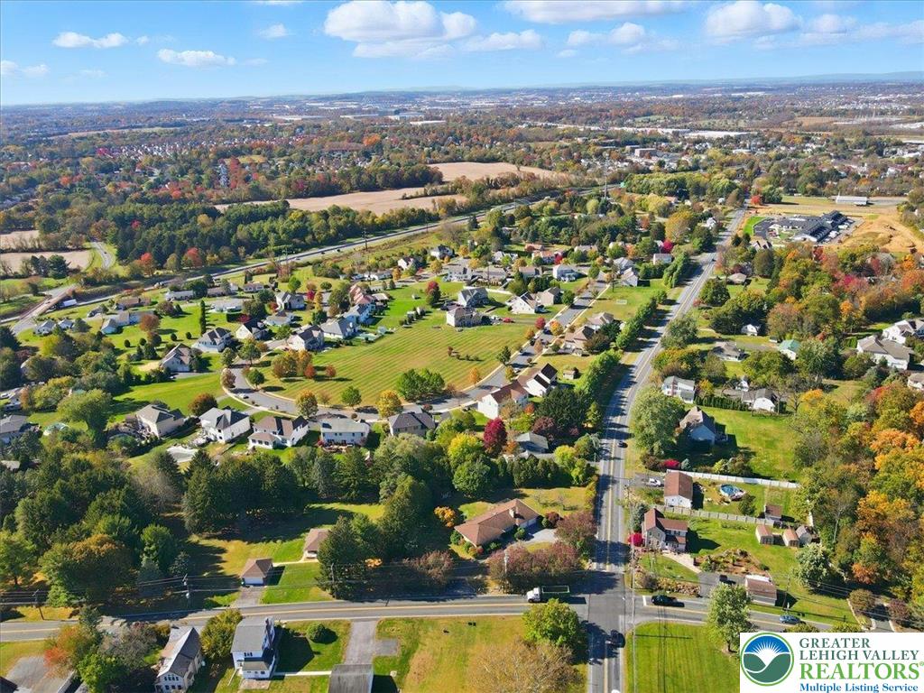 4395 East Texas Road Allentown, PA 18103 - Photo 77 of 81 an aerial view of residential houses with outdoor space and trees