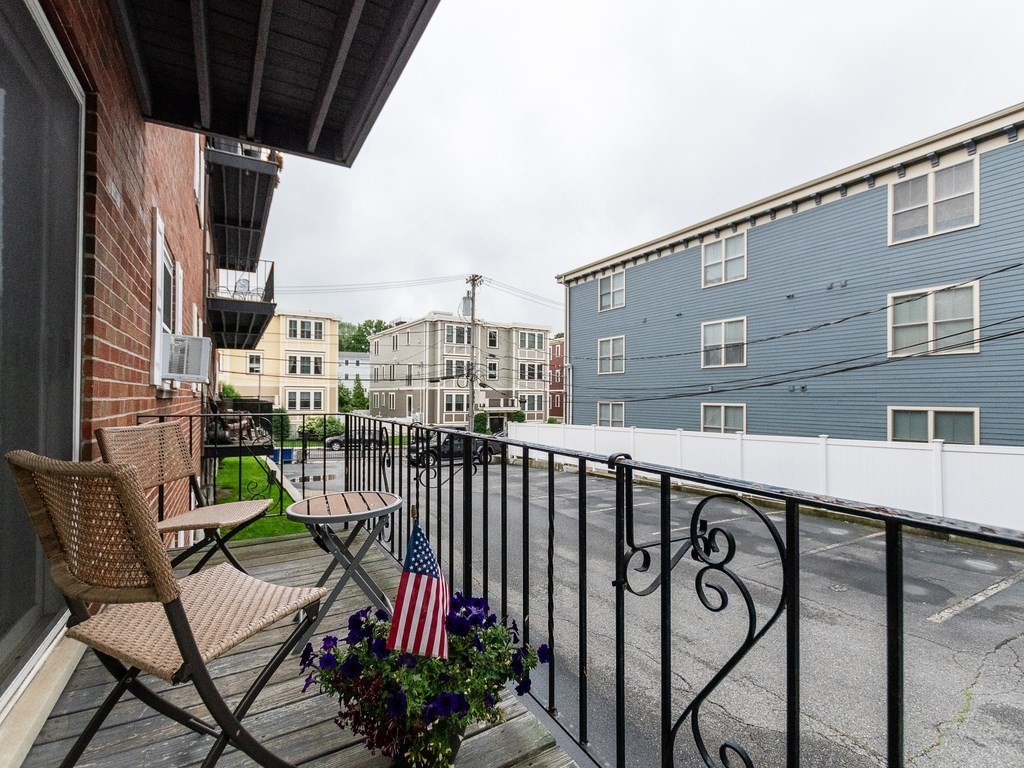 48 Coffey Street, Unit 5B Boston, MA 02122 - Photo 19 of 31 a view of balcony with furniture