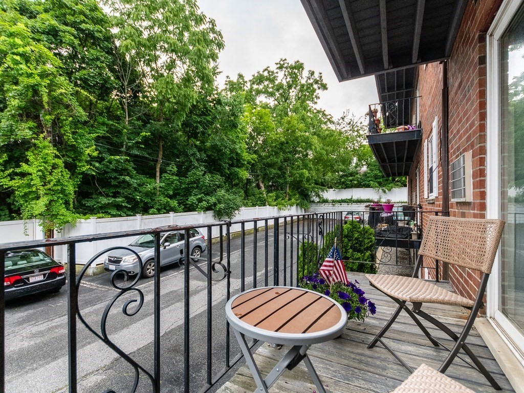 48 Coffey Street, Unit 5B Boston, MA 02122 - Photo 20 of 31 a view of a balcony with furniture