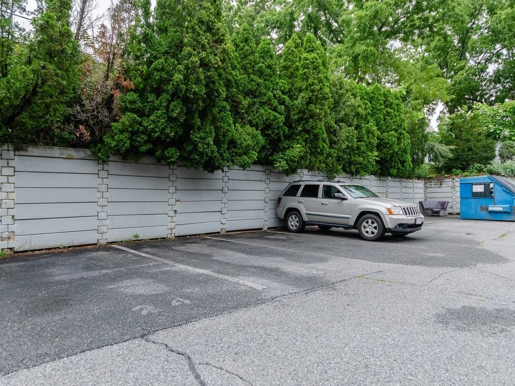 48 Coffey Street, Unit 5B Boston, MA 02122 - Photo 29 of 31 a view of a car parked in a parking lot
