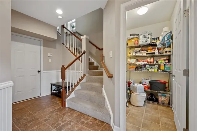 a view of entryway and workspace