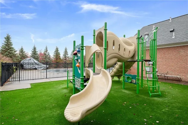 a sign of a park on a road