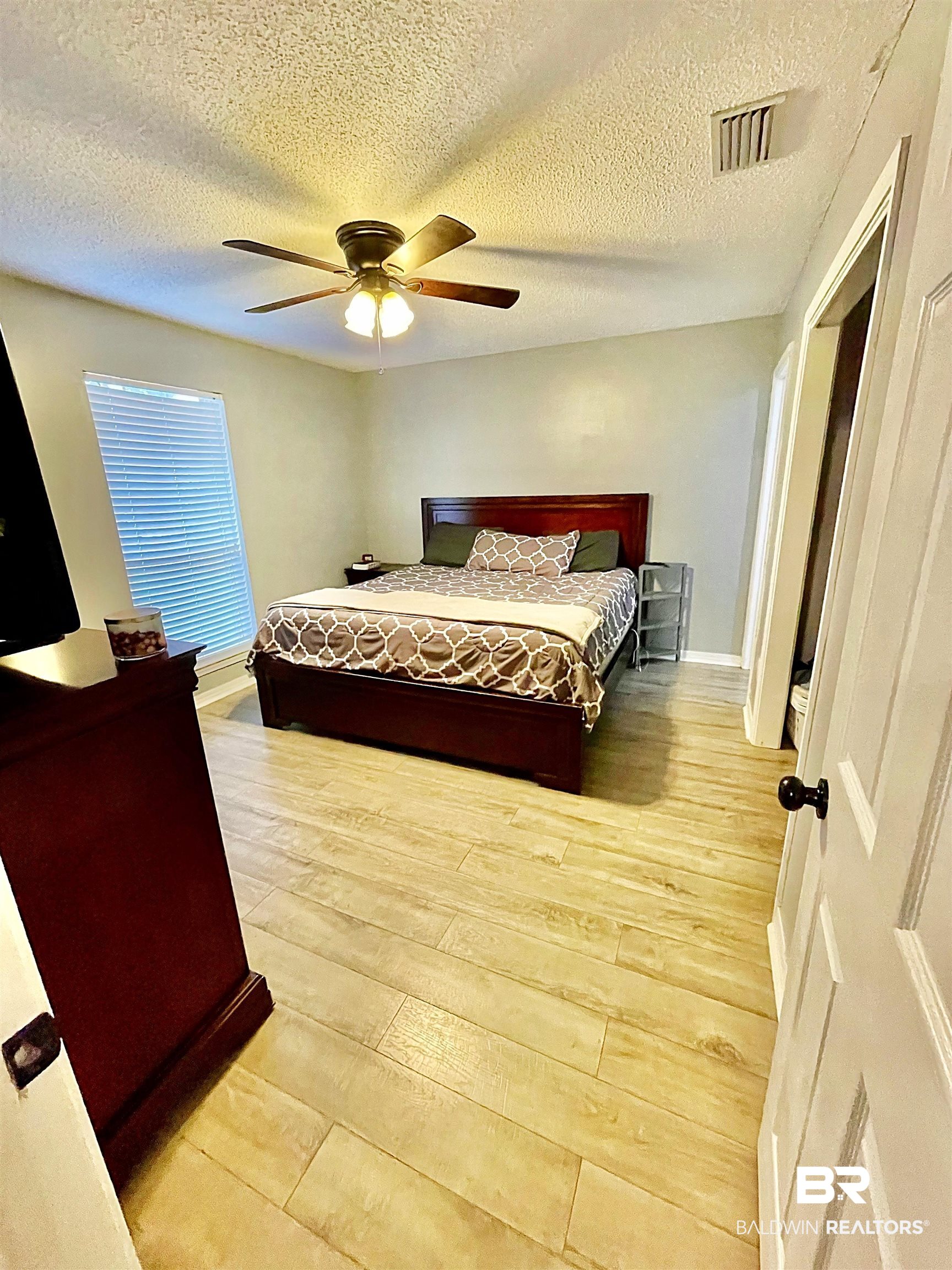 5471 Drexel Drive Theodore, AL 36582 - Photo 9 of 12 Primary Bedroom