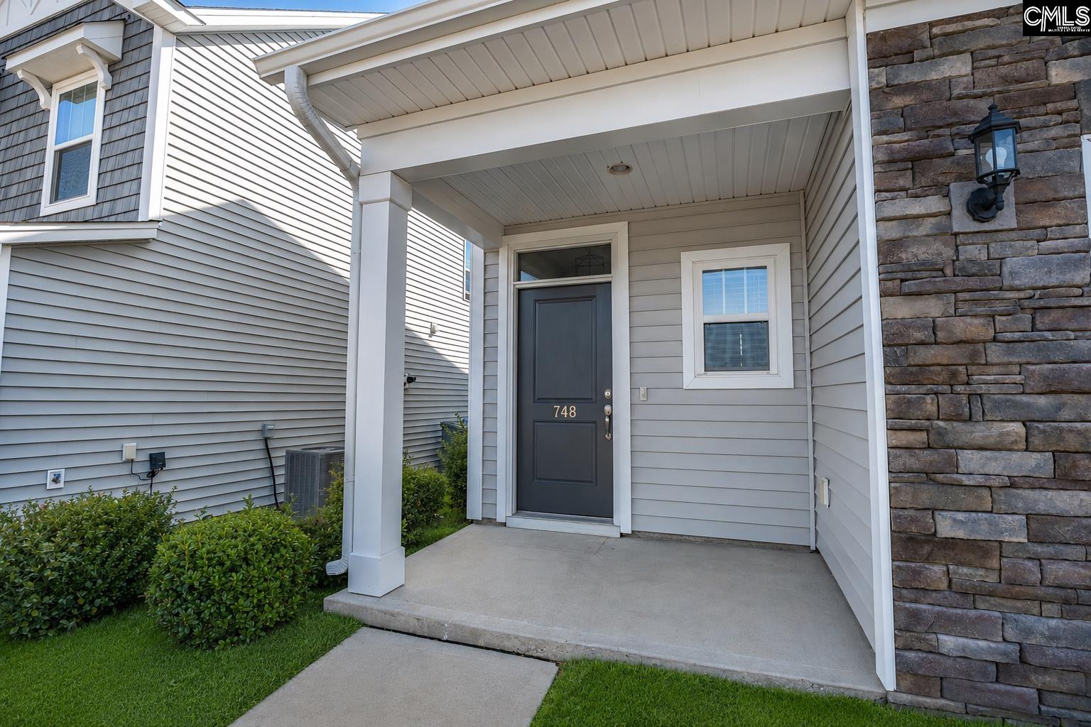 748 North Pinewalk Way Elgin, SC 29045 - Photo 2 of 25 a view of a house with garage
