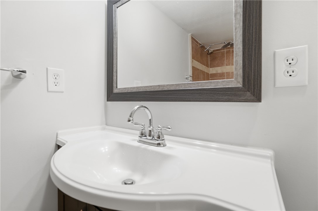 1208 Jarva Lane Springboro, OH 45066 - Photo 57 of 75 This bathroom features a contemporary sink vanity with a stylish framed mirror.