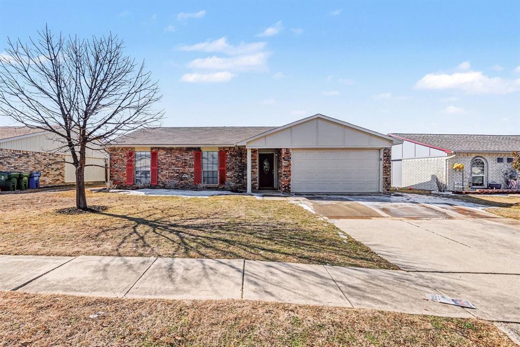 5549 Ragan Drive The Colony, TX 75056 - Photo 1 of 22 a house view with a outdoor space