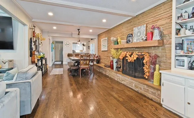 a lobby with furniture and wooden floor