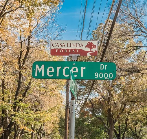 a sign broad on side of a road